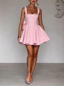 SEQUINED STRAPLESS BOW DRESS