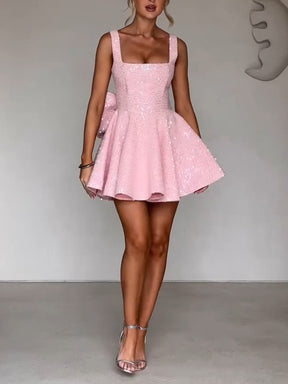 SEQUINED STRAPLESS BOW DRESS